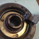 Backside of harmonic balancer/crank pulley assembly, with oil seal and trigger plate attached
